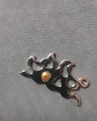 ciondoli in acciaio con inserti in oro 