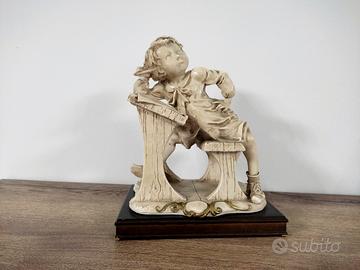 statua in ceramica bambino studente vintage 
