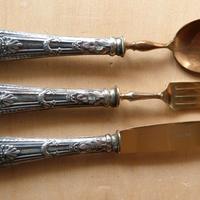 Un coperto con manico in argento 800/1000