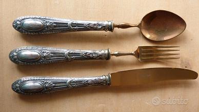 Un coperto con manico in argento 800/1000