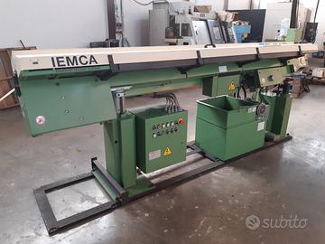 Tornio e caricatore di barre