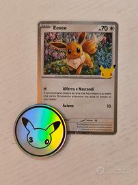 carta pokemon Eevee con moneta 30th