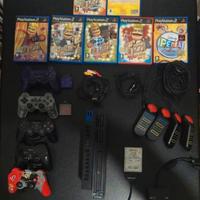 PlayStation 2 con accessori e giochi