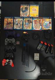PlayStation 2 con accessori e giochi