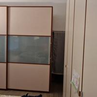 Armadio camera da letto ante scorrevoli.