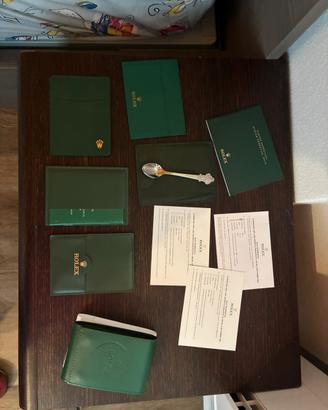 Stock Rolex accessori + pochette cartier