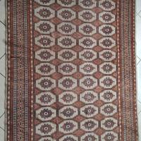 Tappeto orientale geometrico annodato a mano