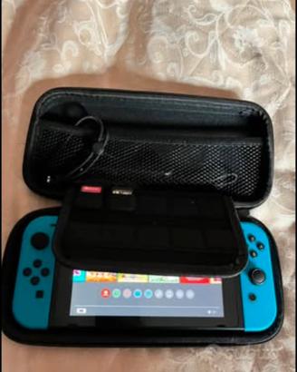 bundle nintendo switch + 5 giochi