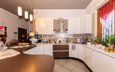 Quadrilocale in centro con giardino e doppi serviz