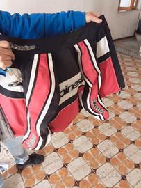 Casco,giubbotto,cavalletti,pantaloni,guanti moto