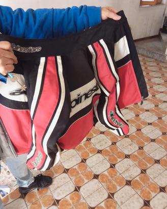 Casco,giubbotto,cavalletti,pantaloni,guanti moto