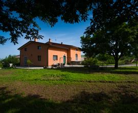 Casa con giardino