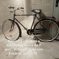 Bicicletta con freni  a bacchetta .