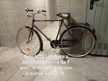 Bicicletta con freni  a bacchetta .