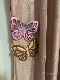 Magneti  tende a forma di farfalla