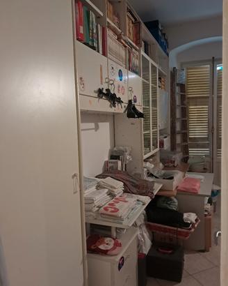 parete attrezzata stanza 