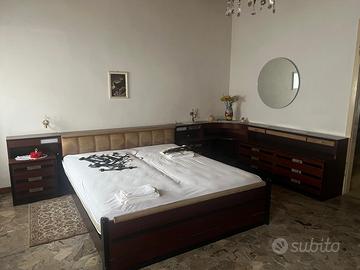 Letto ad angolo con inclusa cassettiera