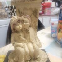 statuina vintage firmata roccia resina