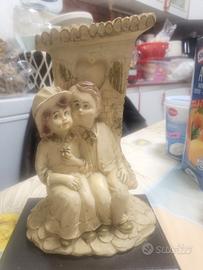 statuina vintage firmata roccia resina