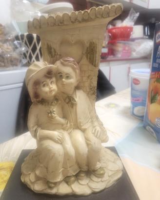 statuina vintage firmata roccia resina