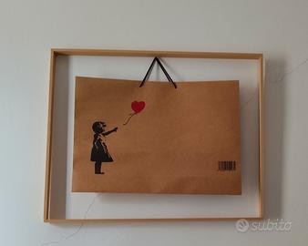 Banksy busta con la cornice