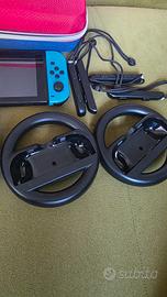 Nintendo switch  con accessori in foto, doppio joy