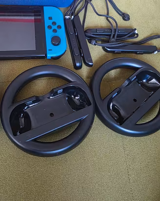 Nintendo switch  con accessori in foto, doppio joy