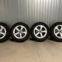 4 cerchi in lega Audi + gomme invernali 215/65 R17