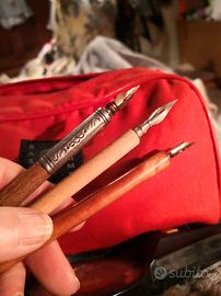 penne antiche con pennino ed inchiostro 