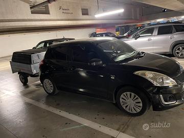 Suzuki swift completa di rimorchio