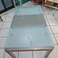 Tavolo allungabile in vetro con inserto in legno