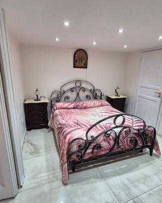 Camera: Letto Ferro Battuto e Trittico Classico