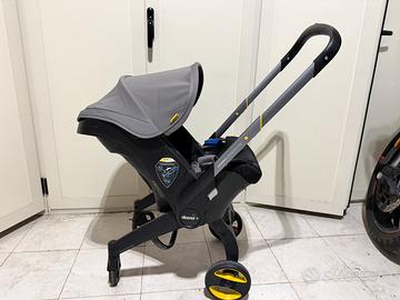 Ovetto sediolino Passeggino Doona + base isofix