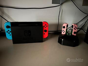 Nintendo switch  + 9 giochi + scheda di memoria