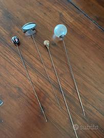 Spille antiche per cappello