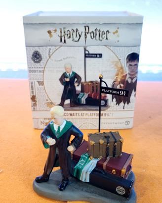 Draco waits at platform 9 3/4 Enesco