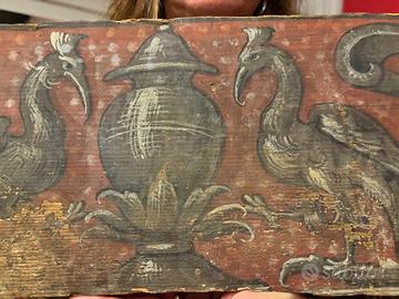 Formelle antiche, dipinte su legno