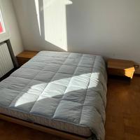 Letto matrimoniale con comodini