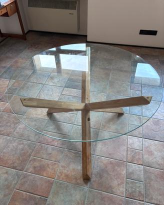 Tavolo rotondo in vetro con gambe in legno