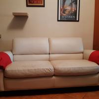 Divano letto in pelle color avorio