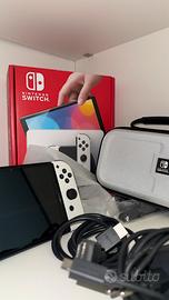 Switch OLED + Custodia Ufficiale + Microsd 64gb
