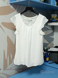 Blusa bianca con inserti in pizzo