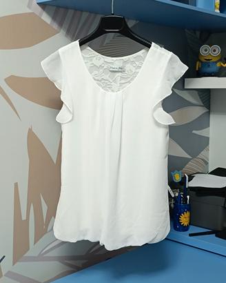 Blusa bianca con inserti in pizzo