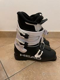 Scarponi da sci bambino e caschetto