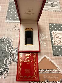 Accendino Must de Cartier vintage lacca nera e oro
