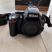 Nikon D5100 + Obiettivo + Nikon Coolpix S9700