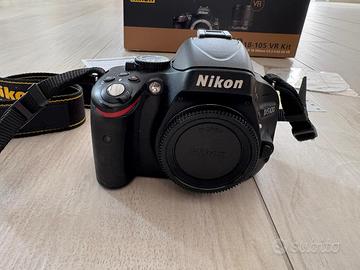 Nikon D5100 + Obiettivo + Nikon Coolpix S9700