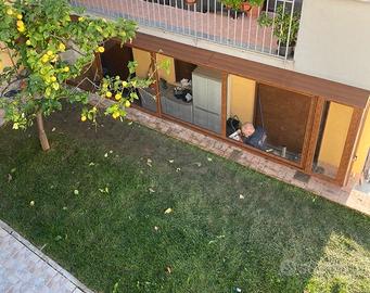 Veranda in alluminio effetto legno. 