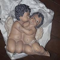 Due Angeli che si baciano