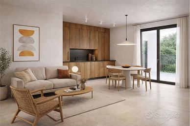 Trilocale con terrazzi e giardino privato